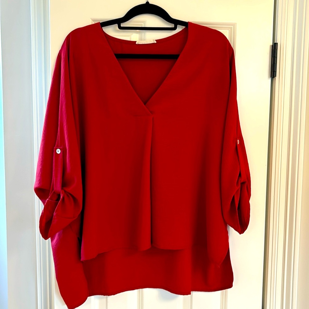 Entro red blouse in size medium.